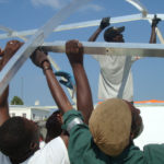 People setting up a Mobile hospital building in Haiti post Earthquake