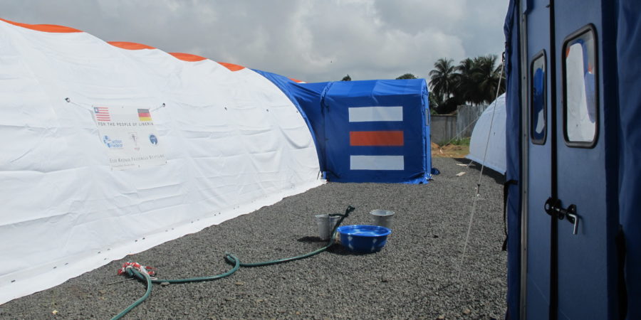 small washing station outside blu-med fabric structures