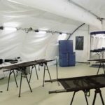 Interior of fabric field hospital's triage and ER area