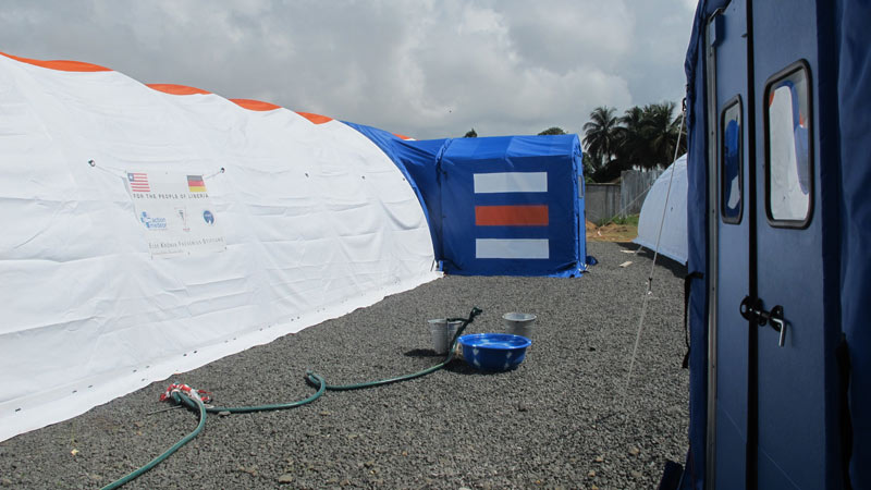 hose between two emergency medical tents