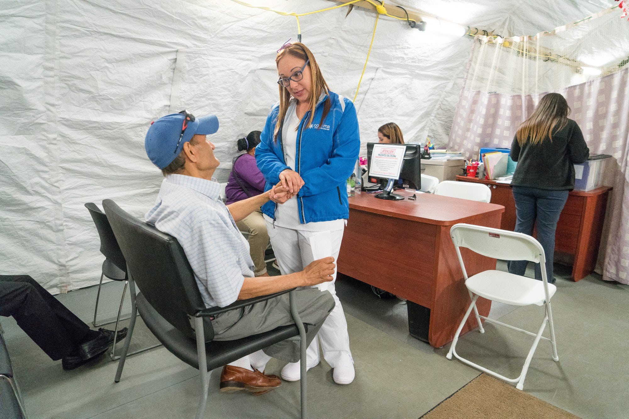 patient cared for in deployable medical shelter