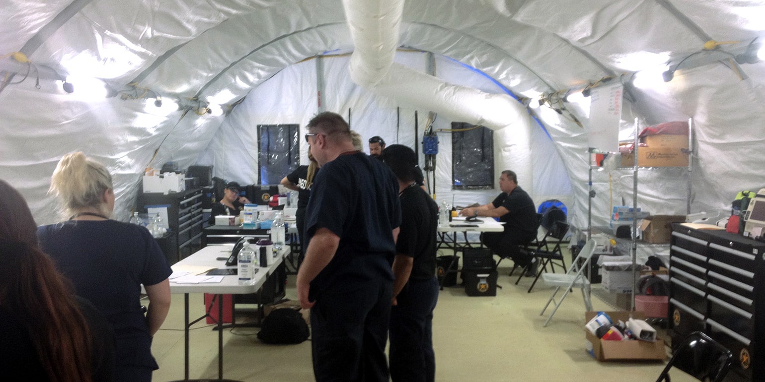 First responders inside portable hospital tents after Hurricane Harvey in Port Arthur, TX